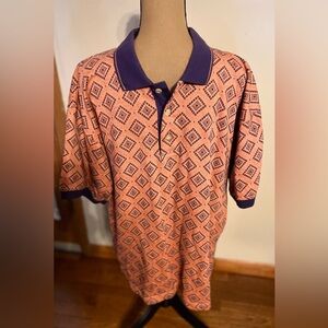 GREG NORMAN SHARK PERFORMANCE POLO  TERRACOTTA WITH PURPLE COLLAR, SIZE L
